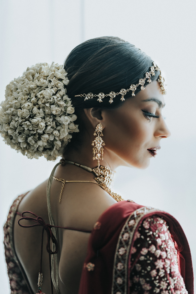 An Elegant, Modern Indian Wedding with a Touch of Harry Potter - Over The  Moon | Indian bride poses, Indian bride photography poses, Indian wedding  poses
