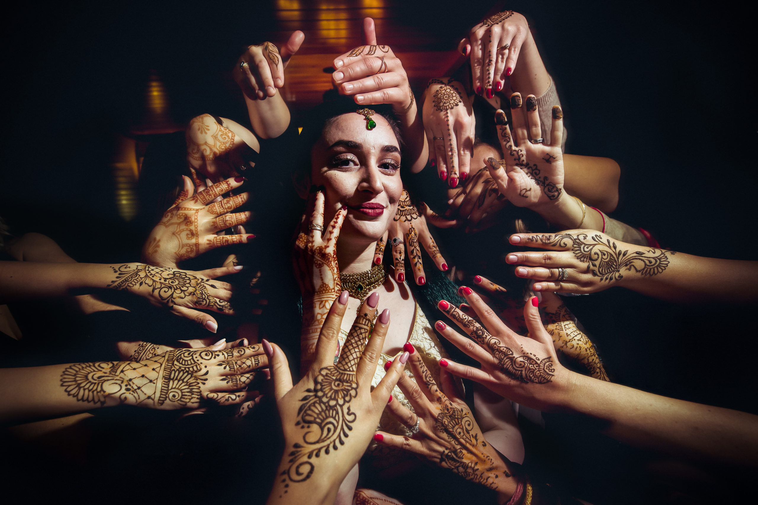 Bride Getting Mehndi Henna Done Before Indian Celebration, Interfaith  Wedding