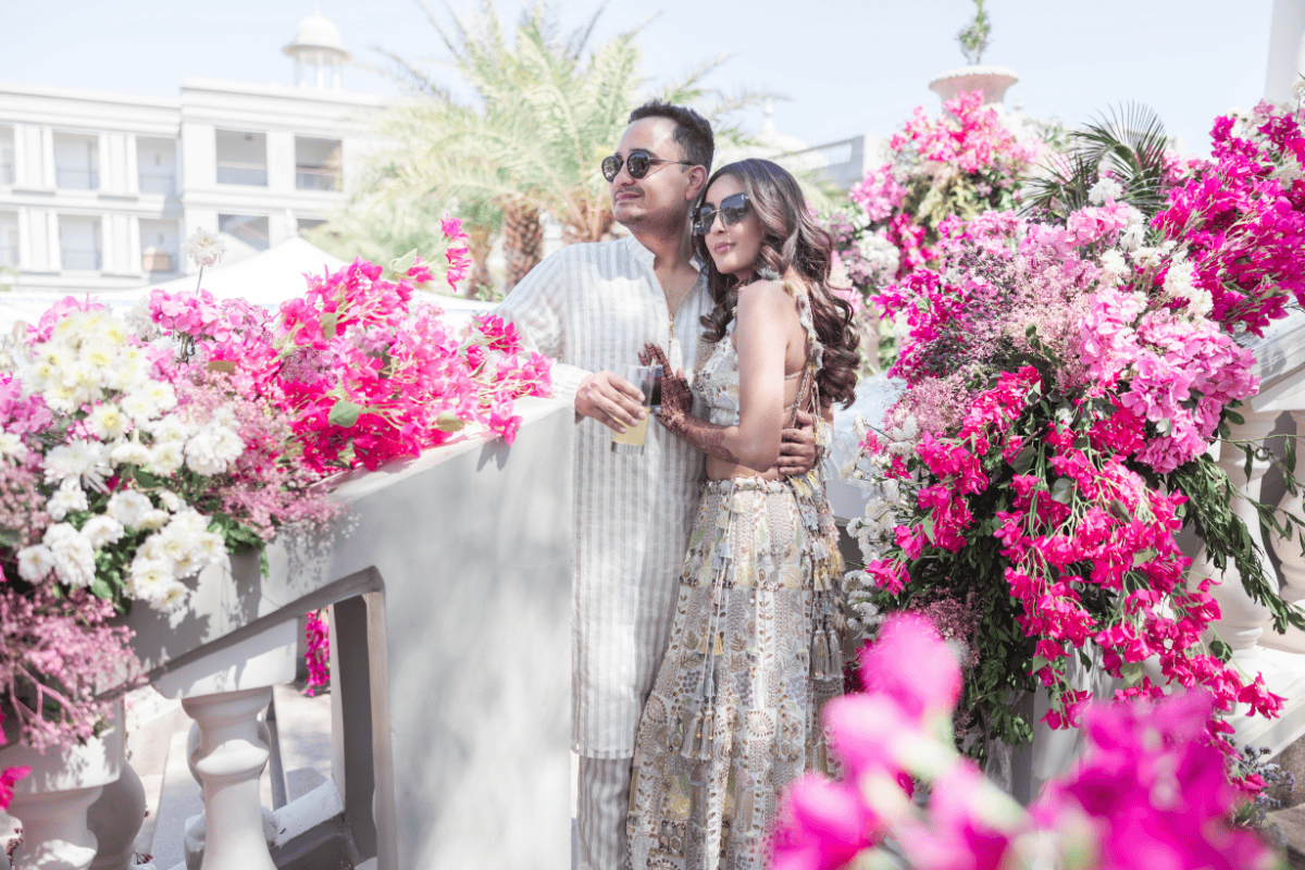 Gorgeous staircase décor with flowers and lighting for a luxury Indian wedding planned by A3Cube Events India, photographed by Ptaufiq Photography.