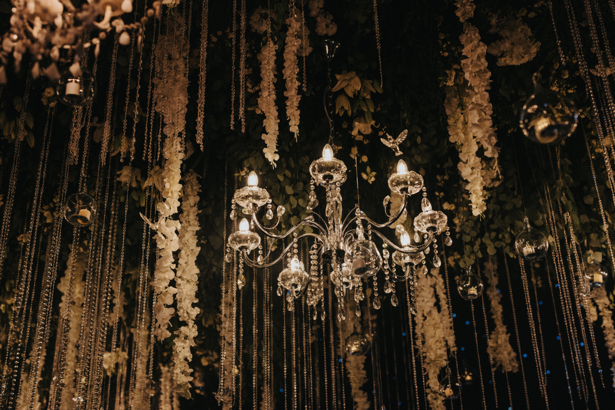 Luxury reception setup with floral arrangements styled by Beloved Planners, captured by PTaufiq Photography