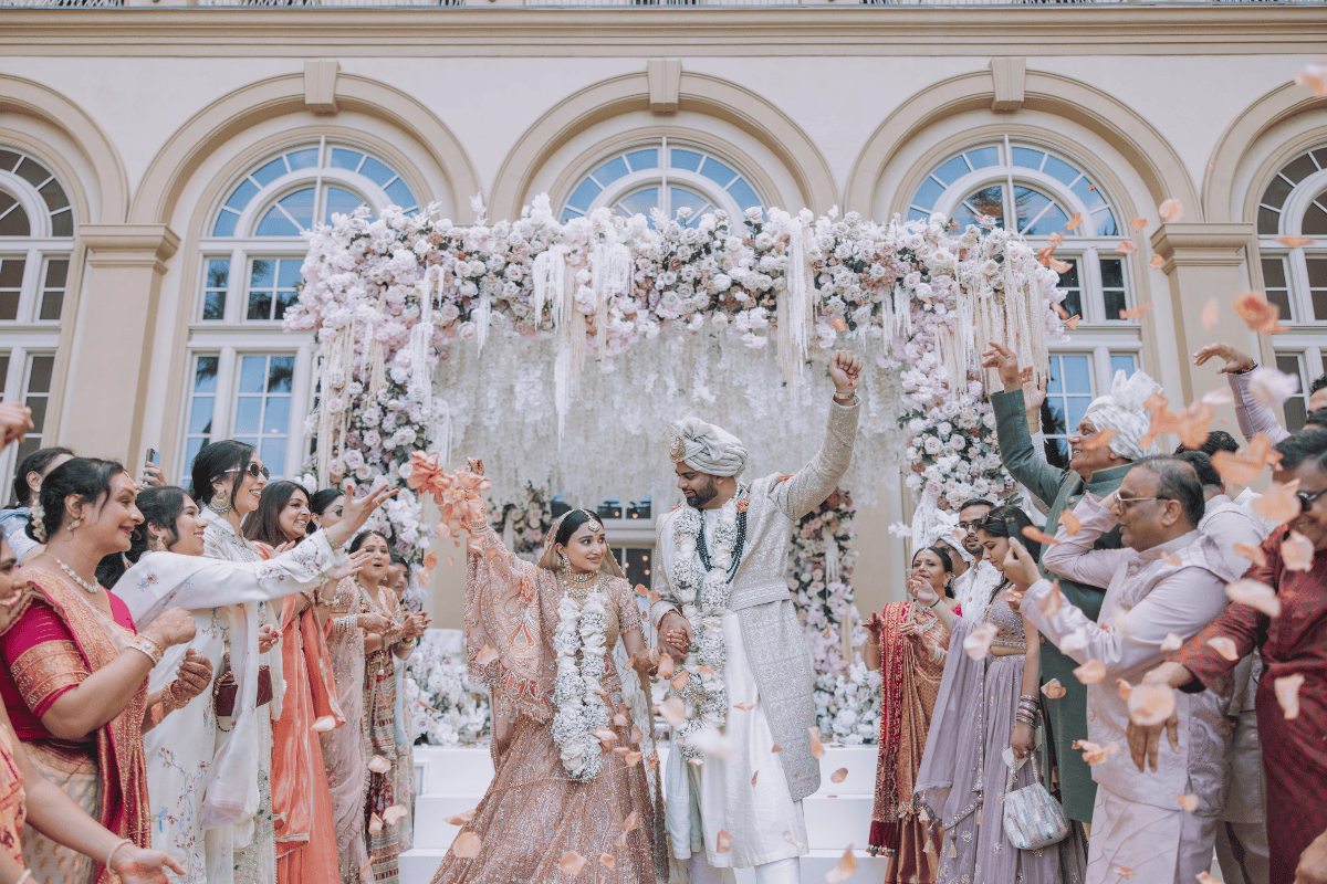 Bride and groom sharing a special moment at a globally designed wedding by Electric Karma International captured by PTaufiq Photography