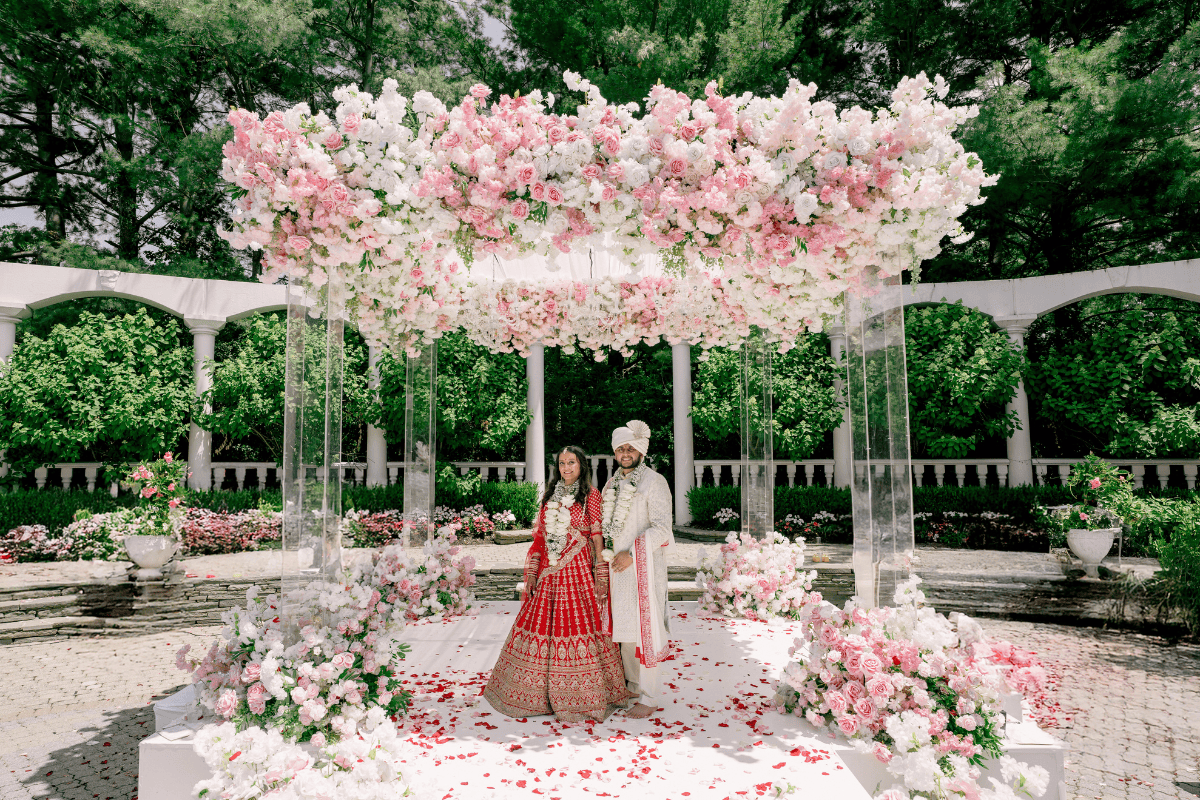 Luxury wedding mandap adorned with floral décor by Affinity Events | PTaufiq Photography